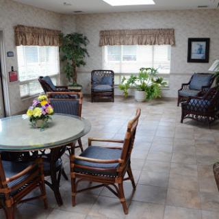A spacious and inviting waiting area featuring comfortable seating and natural light.
