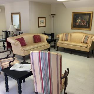 A cozy living room with classic furniture and decor.