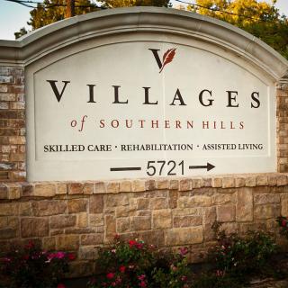Entrance sign for Villages of Southern Hills offering skilled care, rehabilitation, and assisted living.