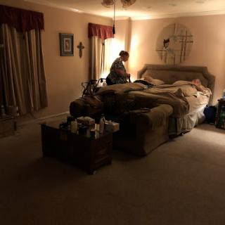 A serene nighttime scene in a cozy bedroom.
