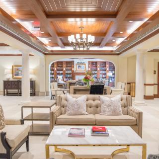 A luxurious living room interior with elegant furniture and decor.
