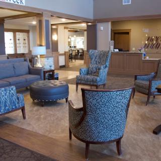 A stylish and modern lobby area featuring comfortable seating arrangements.