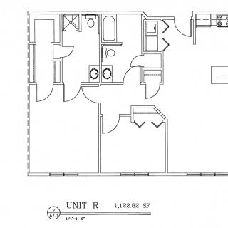 Architectural floor plan of Unit R, showing the layout of rooms and amenities.