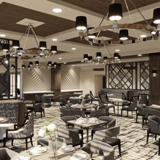 Modern restaurant interior with stylish chandeliers and seating arrangements.