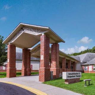 The entrance of a modern institutional building.