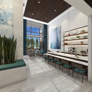 A spacious, modern cafe interior with sleek design elements and ample natural light.