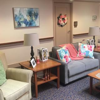 A cozy and inviting living room setup with a mix of modern and decorative elements.