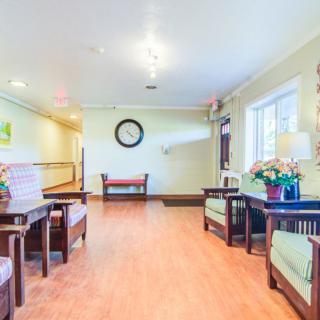 A bright and welcoming lobby area with comfortable seating and decorative elements.