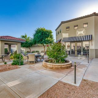 A well-maintained courtyard with outdoor seating and landscaping.