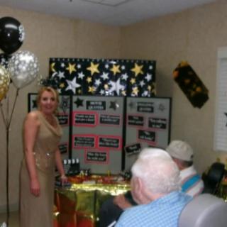 A festive indoor celebration with balloons and decorations.