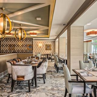 A modern and elegant restaurant interior with stylish decor and comfortable seating.
