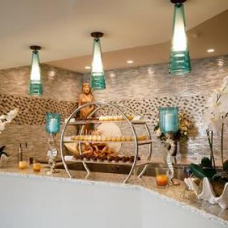 A modern, luxurious interior with elegant lighting and decor elements.