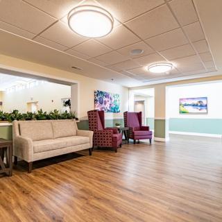 A modern lobby area featuring comfortable seating and ambient lighting.