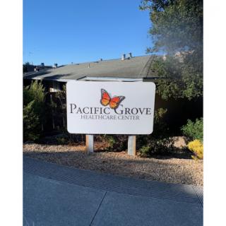 Welcome sign for Pacific Grove, featuring a butterfly motif.