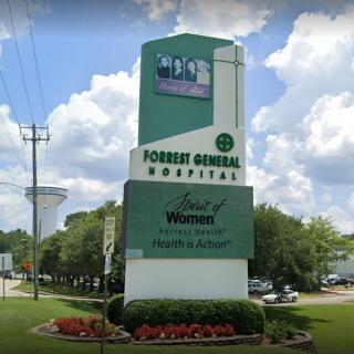 Sign for Forrest General Hospital in an outdoor setting.