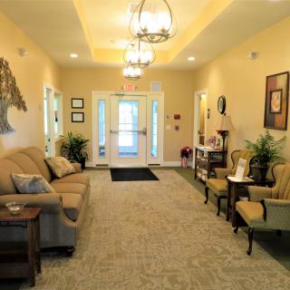 A cozy lobby area with comfortable seating and elegant decor.