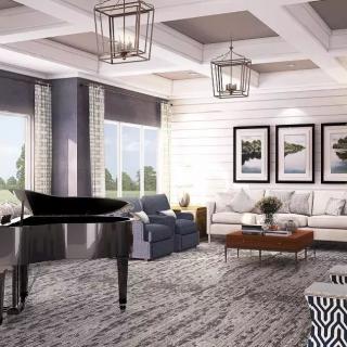 A modern living room featuring a grand piano and stylish decor.