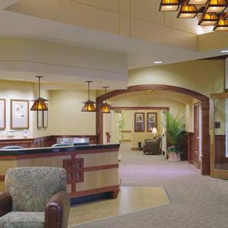 A welcoming lobby with a reception desk and comfortable seating.