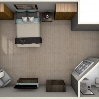 A top view of a modern bedroom layout featuring a bed, side tables, and seating area.