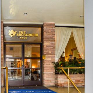 Entrance to a restaurant with signage and decorative elements.