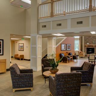 A modern lobby with comfortable seating and stylish decor.