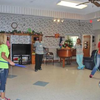 A group of people participating in an indoor recreational activity.
