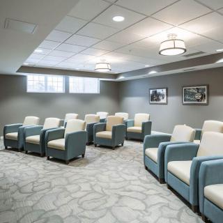 A modern meeting space with comfortable seating.