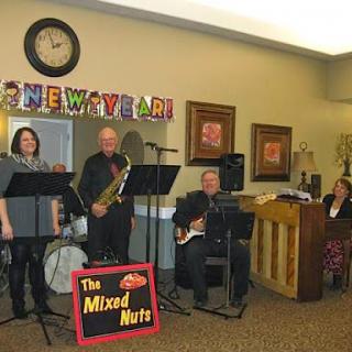 The Mixed Nuts band performing at a New Year's celebration.