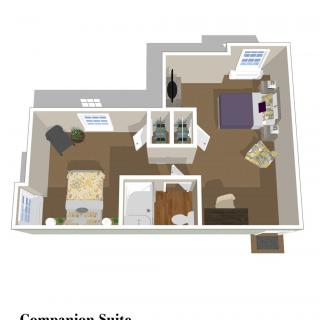 A 3D floor plan of a companion suite featuring a bedroom, living area, and bathroom.
