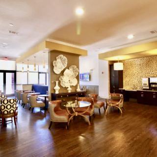 A modern lobby area with stylish seating and decorative elements.