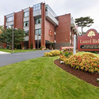 Laurel Ridge Hotel - A cozy retreat surrounded by lush greenery.