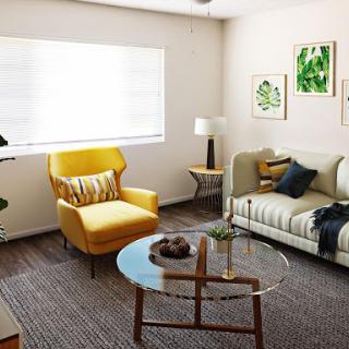A stylish and cozy living room featuring modern decor and a vibrant yellow chair.