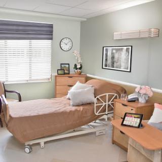 A comfortable hospital patient room designed for recovery.