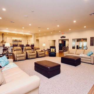 Spacious living room with comfortable seating and modern decor.