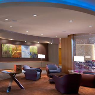 A modern lobby with comfortable seating and artistic decor.