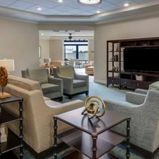 A modern living room with comfortable seating and stylish decor.