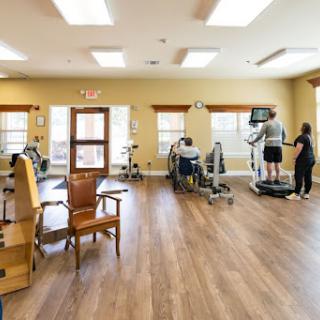 A spacious gym area designed for rehabilitation and fitness activities.