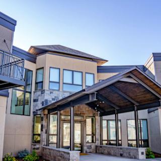 A beautifully designed modern building featuring a welcoming entrance.