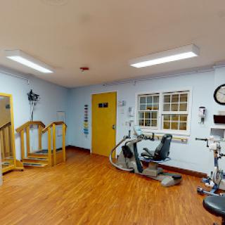 A well-equipped physical therapy room designed for rehabilitation and mobility training.