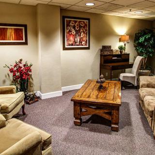 A cozy living room with comfortable seating and stylish decor.