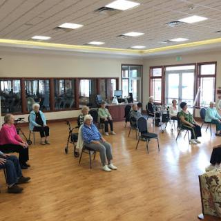 Seniors participating in a group activity at a community center.