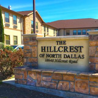 The entrance sign for The Hillcrest of North Dallas, a residential community.