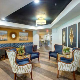 A modern lobby with comfortable seating and elegant decor.