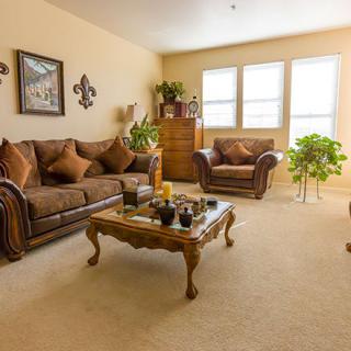 A cozy living room with elegant furniture and natural light.