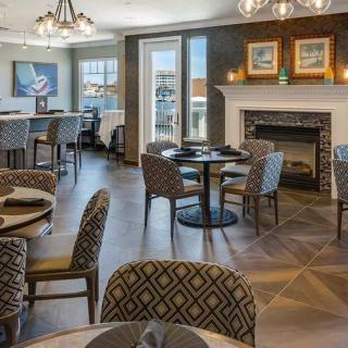 Modern restaurant interior with stylish decor and cozy seating.