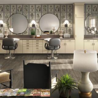 A modern salon interior featuring stylish mirrors and comfortable chairs.