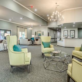 A modern lobby with stylish seating and elegant lighting.