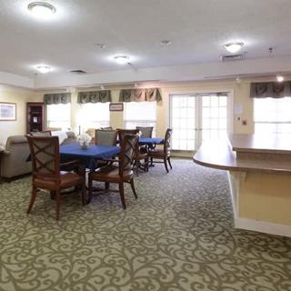 A cozy living space with a dining area and comfortable seating.