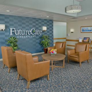 A modern waiting area with comfortable seating and decor at FutureCare.