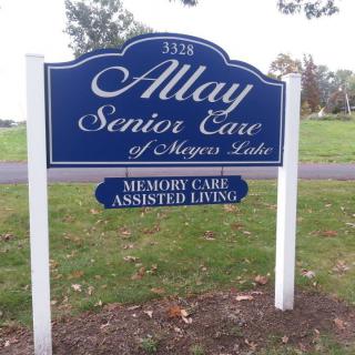 A sign for Allay Senior Care of Meyers Lake, offering memory care and assisted living services.